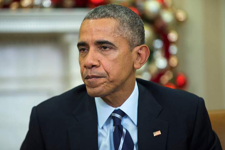 President Barack Obama makes a statement on Wednesday's mass shooting in San Bernandino, Calif., Thursday, Dec. 3, 2015, in the Oval Office of the White House in Washington. 