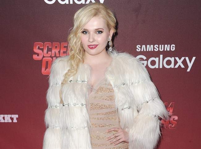 In this Sept. 2015 file photo, Abigail Breslin arrives at the LA premiere screening of "Scream Queens.".