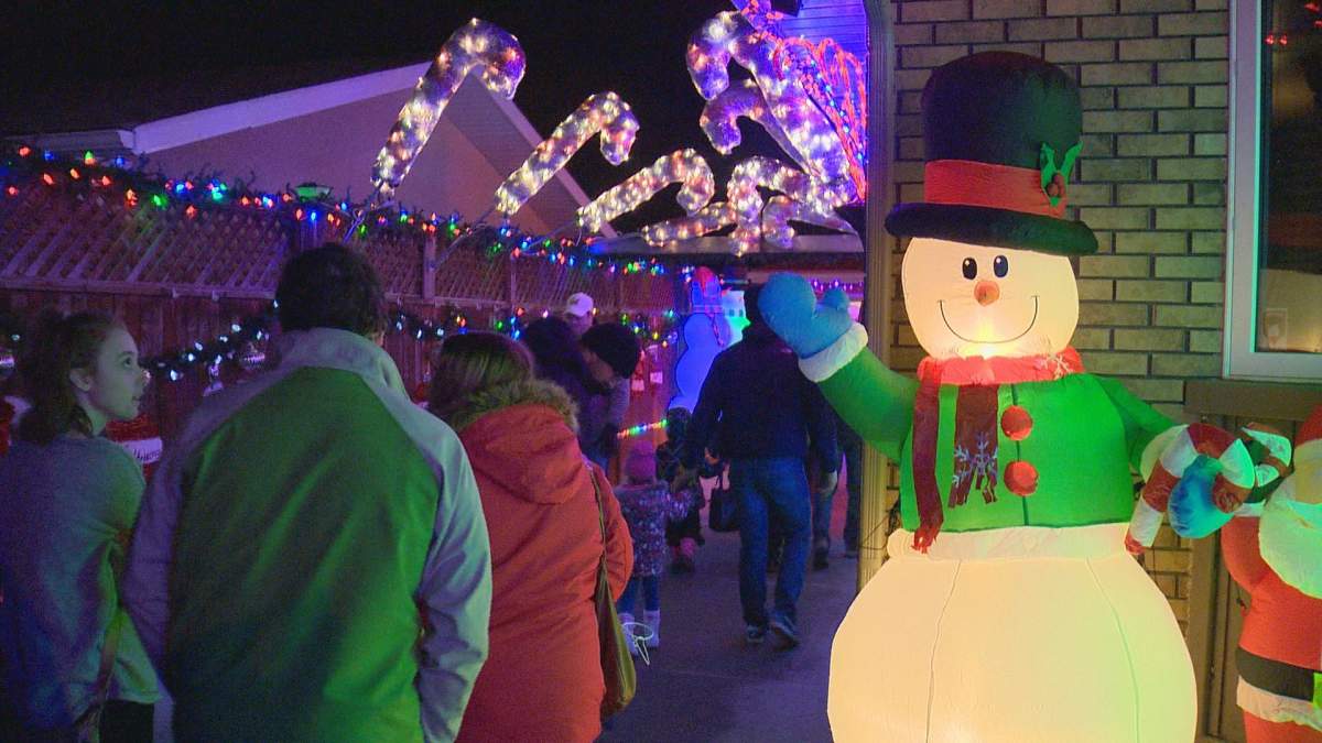 People stream into the backyard for the “Winter Wonderland” set up.