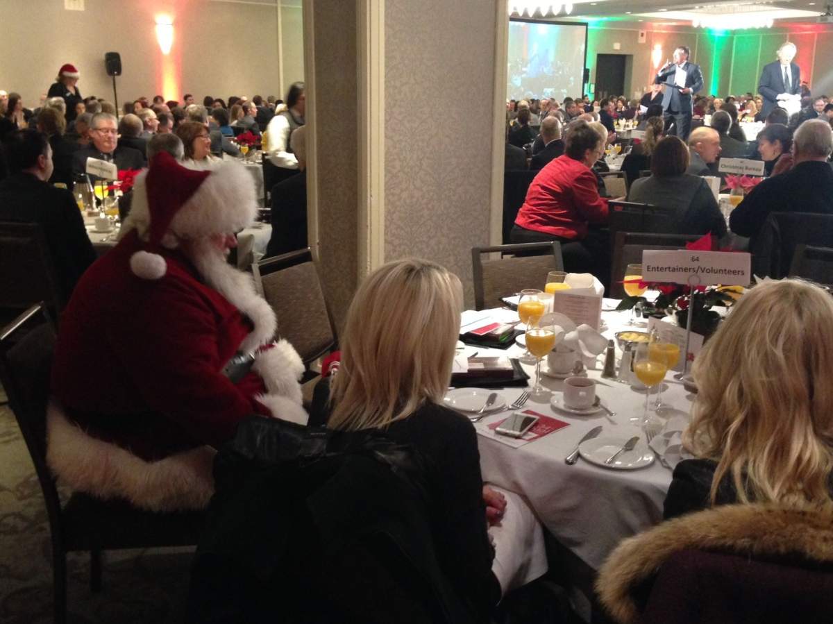 Attendees of the Christmas Bureau of Edmonton's annual breakfast fundraiser, Tuesday, Dec. 15, 2015.