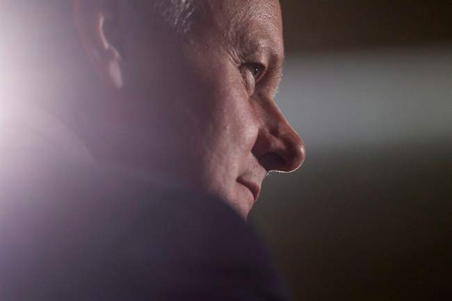 Bank of Canada Governor Stephen Poloz takes his seat before speaking at the Empire Club of Canada in Toronto on Tuesday, December 8, 2015. 