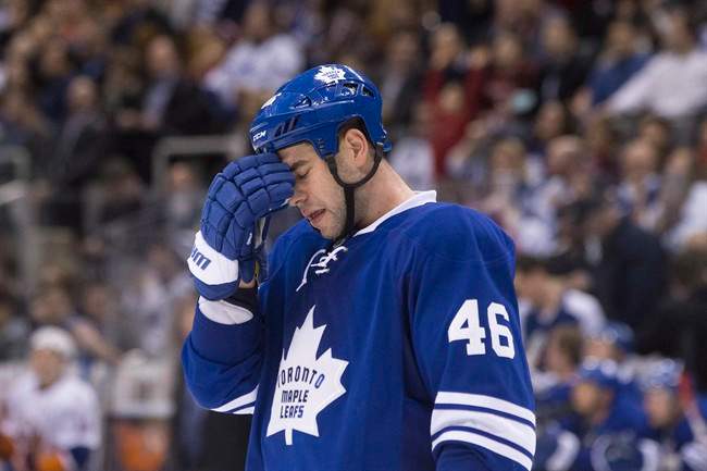 Toronto Maple Leafs\’ defenceman Roman Polak reacts as his team trails 6-2 to the New York Islanders during third period NHL hockey action, in Toronto, on Tuesday, December 29, 2015.