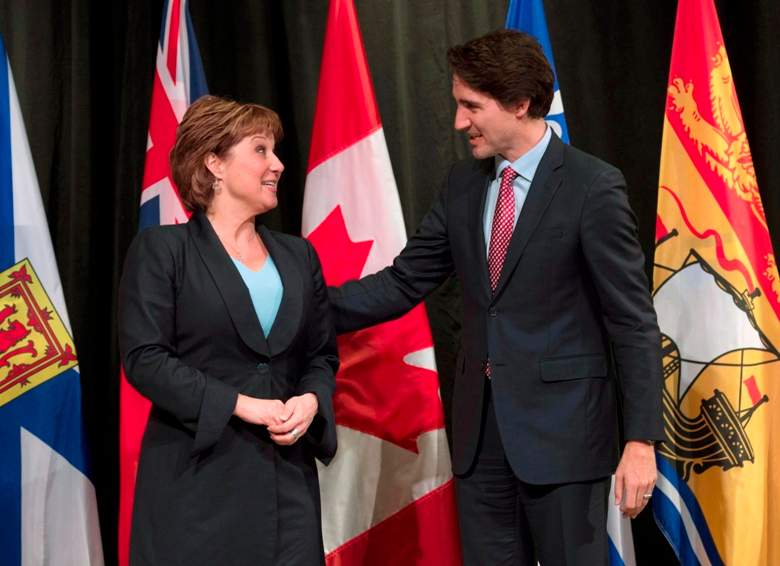 Prime Minister Justin Trudeau speaks with B.C. Premier Christy Clark in a file photo.