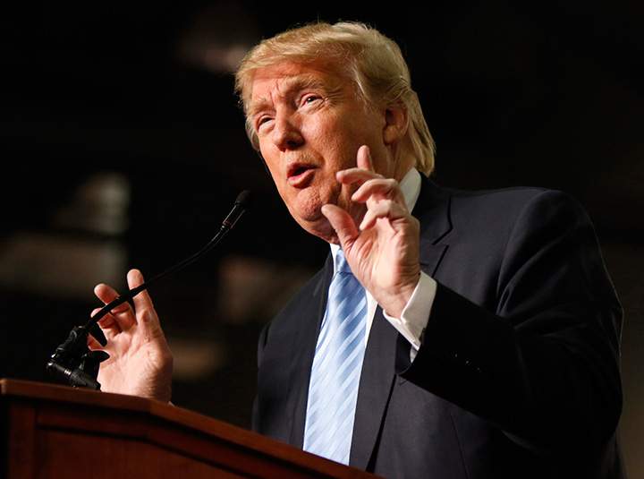 In this Monday, Nov. 23, 2015 file photo, Republican presidential candidate Donald Trump speaks during a rally at the Greater Columbus Convention Center in Columbus, Ohio. 