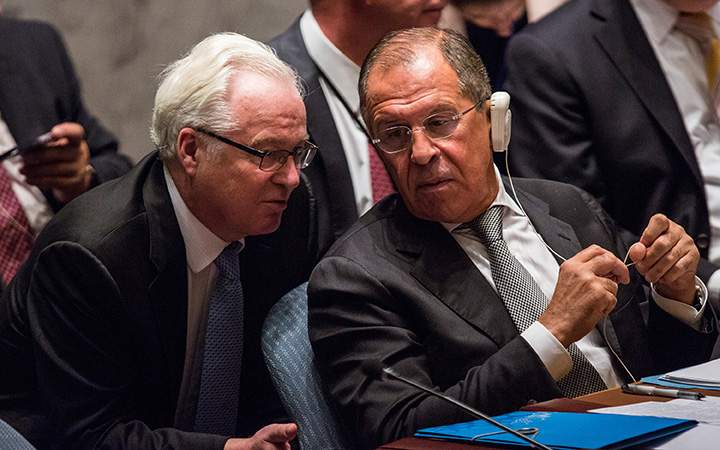 Sergey Lavrov (R), Foreign Minister of Russia, speaks to Vitaly Churkin, Russian Permanent Representative to the United Nations at a U.N. Security Council meeting on September 30, 2015 in New York City. 