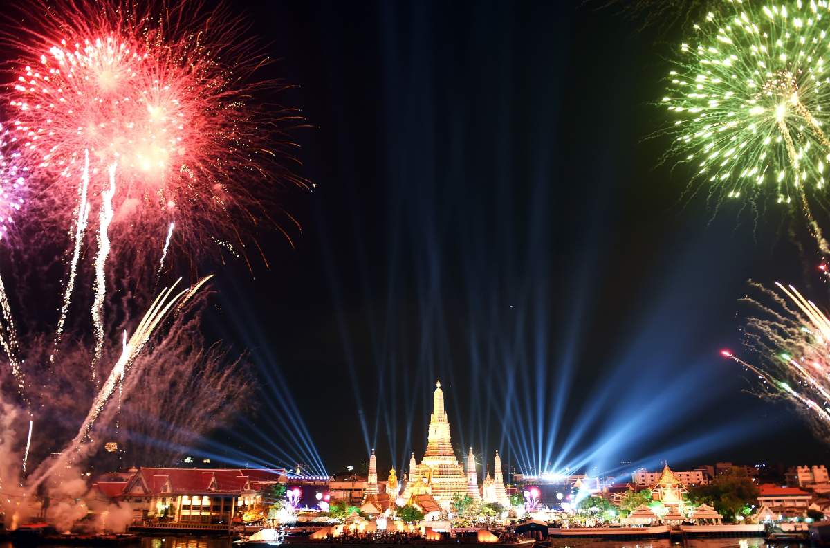 Fireworks light up the sky over Wat Arun (Temple of Dawn) during New Year celebrations in Bangkok on January 1, 2016.