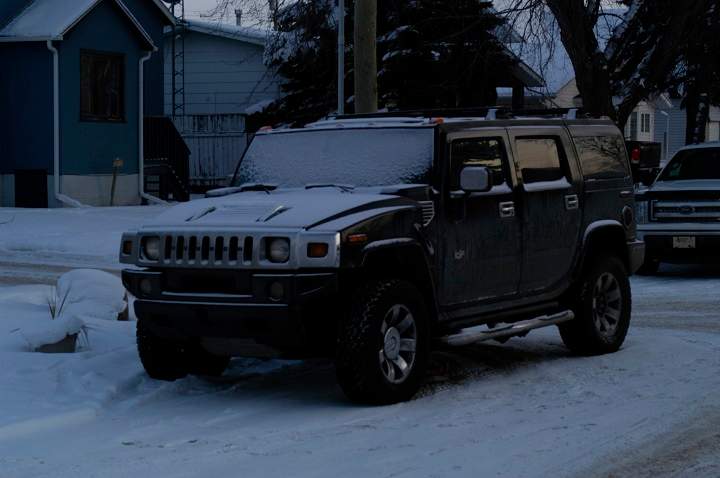 RCMP in Alberta released a photo of a black Hummer H2 SUV they believe the suspect used to drive away from the scene.