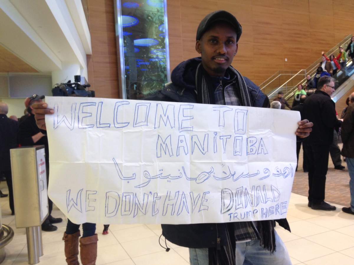 Signs welcoming refugees to the province of Manitoba. 