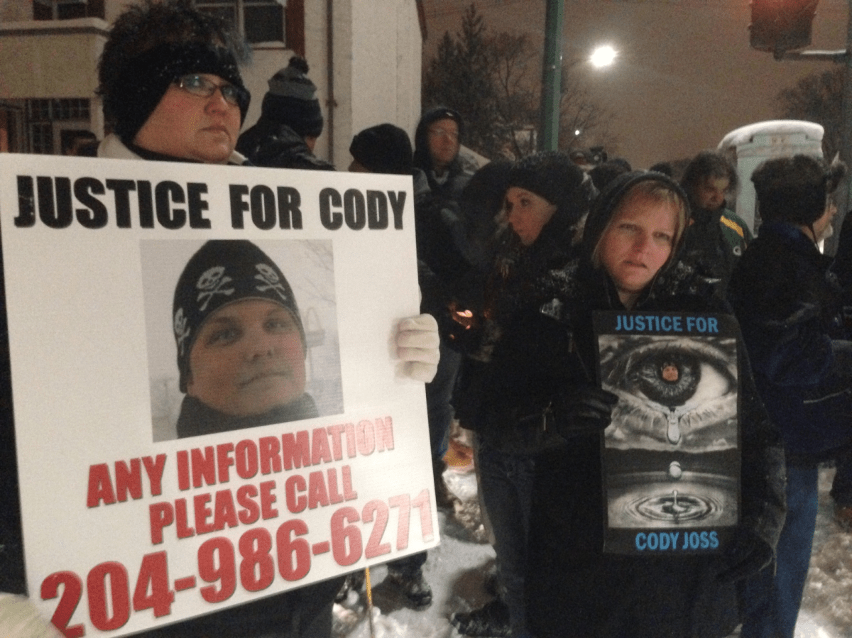 Friends and family of Cody Joss gather for a vigil in 2015, one year after he was killed in a hit-and-run crash.
