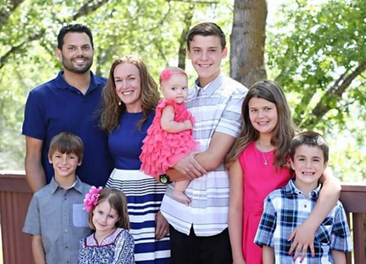 San Bernardino victim Michael Wetzel (left) and his family.