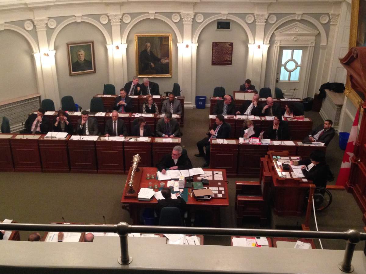 Liberal MLAs are picture on the government side of the legislature during Question Period at 1:13 a.m. on Tuesday, December 15, 2015.