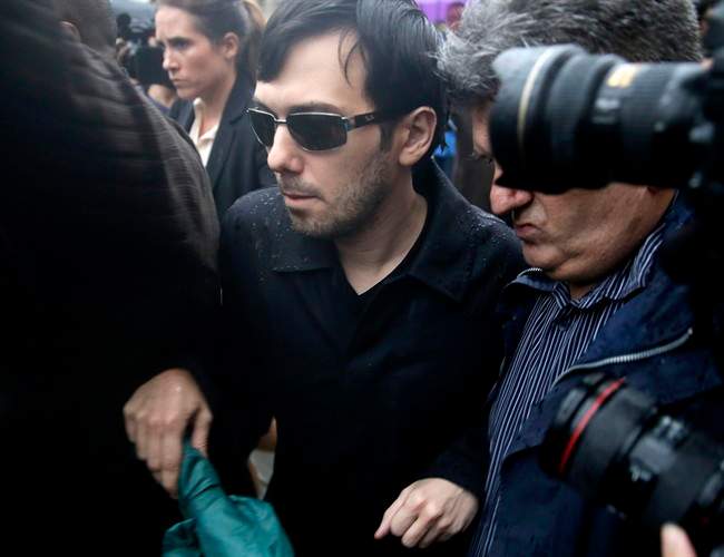 Martin Shkreli leaves the courthouse after his arraignment in New York, Thursday, Dec. 17, 2015. 