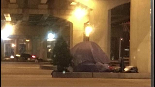 Homeless man gets Christmas tree back thanks to kind strangers after city deems it a ‘violation’ - image