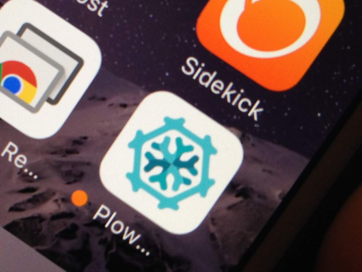 The Plow Me Out app is seen here on a smartphone.