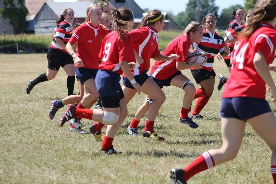 Rowan Stringer carrying the rugby ball. She died after sustaining a brain injury during a game in 2013.