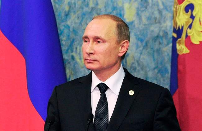 Russian President Vladimir Putin speaks to the media after the COP21 UN Conference on Climate Change in Paris, France, Monday, Nov. 30, 2015. Putin said Monday that he and President Barack Obama have a shared understanding on how to move toward a political settlement in Syria, but added that incidents like the recent downing of a Russian warplane by a Turkish fighter jet stymie broader cooperation against extremism.