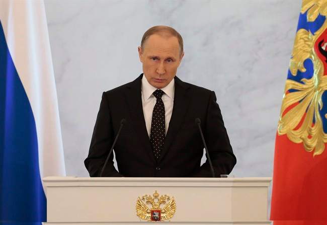 Russian President Vladimir Putin gives his annual state of the nation address in the Kremlin in Moscow, Russia, Thursday, Dec. 3, 2015. (AP Photo/Ivan Sekretarev).