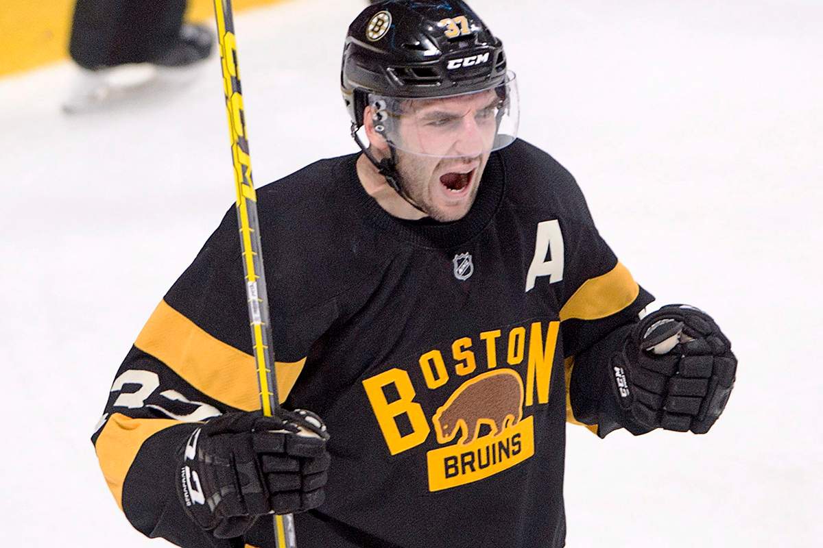 Boston Bruins center Patrice Bergeron celebrates after scoring against the Montreal Canadiens.