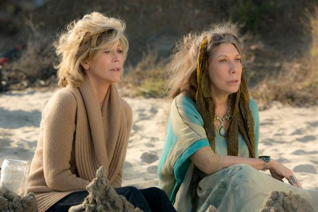 This photo provided by Netflix shows Jane Fonda, left, and Lily Tomlin in the Netflix Original Series “Grace and Frankie.”