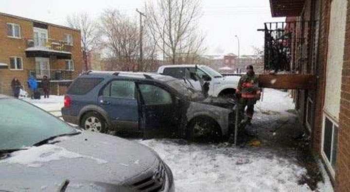 Firefighters extinguished a vehicle fire that spread to the balcony of a nearby apartment building in Saskatoon Monday.