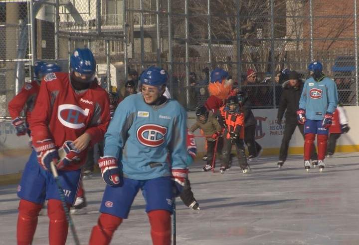 The Montreal Canadiens gather for a rare outdoor practice at the foundation's seventh outdoor ice rink at Parc Émile in Laval, Monday, January 11, 2016.