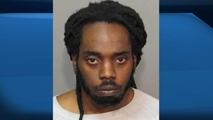 Pierre Louis Hernandes, of Montreal, is still the subject of a Canada-wide warrant for the 2014 robbery in Saskatoon.