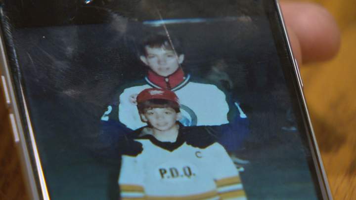 Swift Current Mayor Jerrod Schafer poses for his photo to be taken with Sheldon Kennedy when he was a kid.