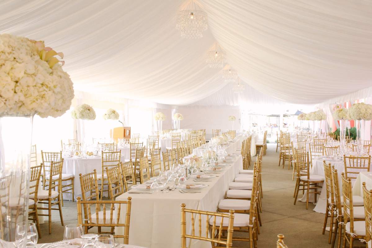 Circles are out, rectangles are in when it comes to wedding reception table arrangements.