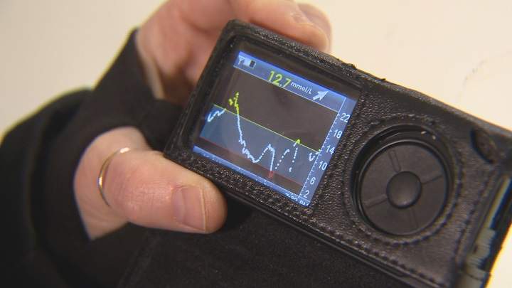 The Dexcom G4 monitor tracks Zack Davis’ blood sugar levels during a hockey practice.