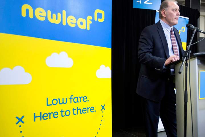 Dean Dacko, Chief Commercial Officer of NewLeaf Travel speaks at a press conference in the arrivals area of the John C. Munro Hamilton International Airport, on Wednesday, Jan. 6, 2016. 
