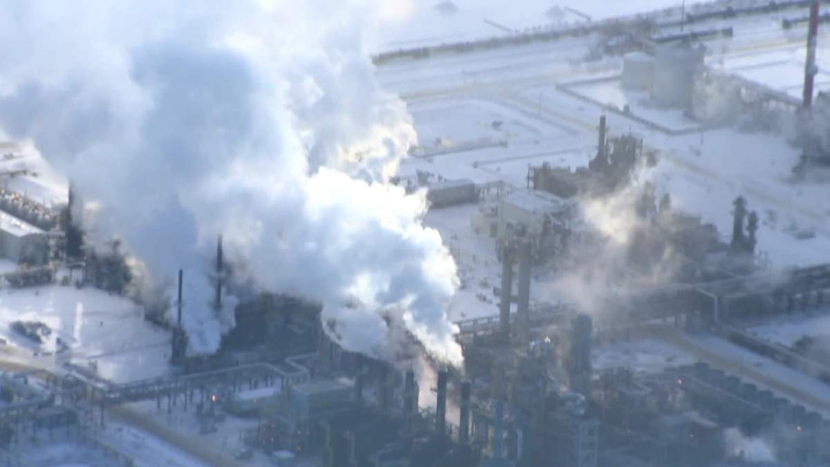 Explosion site at Nexen's Long Lake facility. Half of a building's roof and wall blown off.