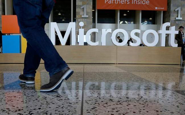 Microsoft president Brad Smith said the company 'wholeheartedly' supports Apple in the debate over hacking an iPhone.