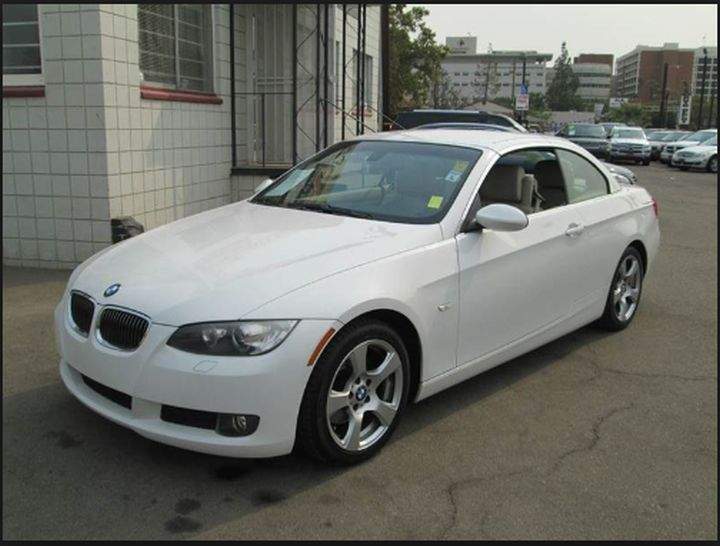 Police say the burned-out vehicle was a white, two-door 2013 BMW 328i coupe, pictured here.