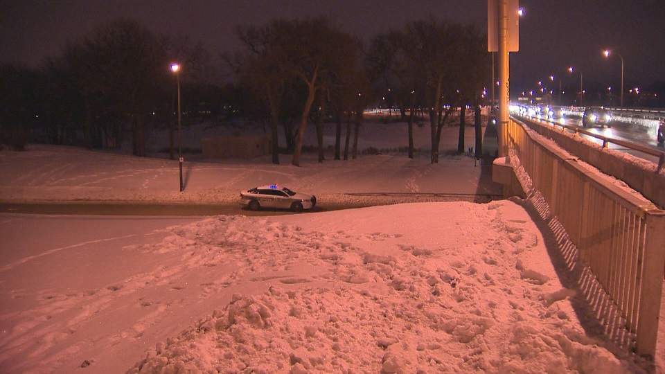 Police investigate under St. Vital Bridge after man was taken to hospital in critical condition around 3:30 a.m. Thursday.