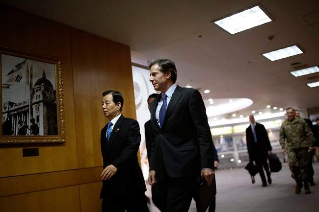 U.S. Deputy Secretary of State Antony Blinken, right, walks with South Korean Defense Minister Han Min-Koo upon his arrival for their meeting at the Defense Ministry in Seoul, South Korea Wednesday.