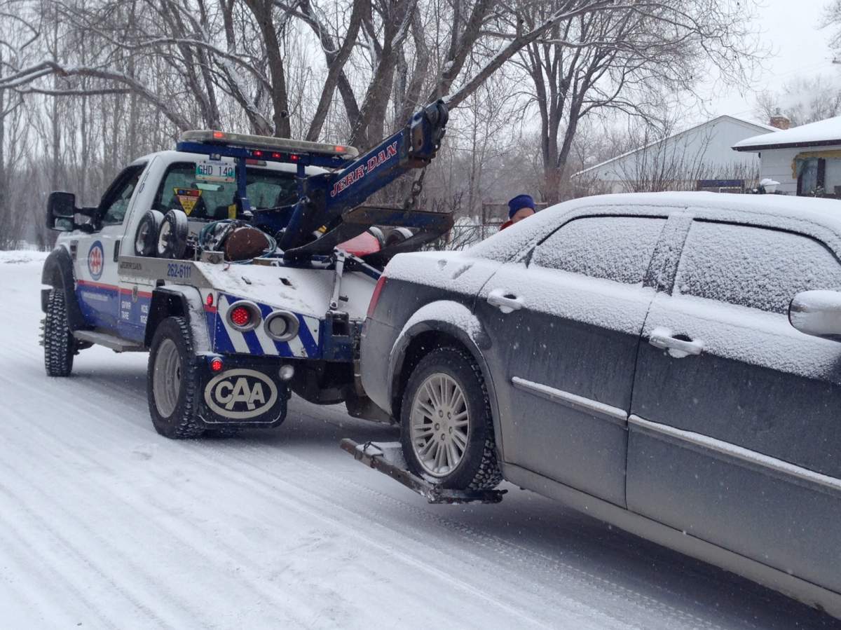 The proposed bylaw would license tow truck drivers and prohibit them from parking, standing or stopping within 200 metres of any crash in London.