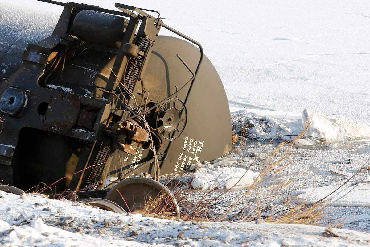 A rail car lays in the broken ice of the Mississippi River at the scene of a train derailment Wednesday, Jan. 27, 2016, along Hwy. 26 south of Brownsville, Minn.  () MANDATORY CREDIT.