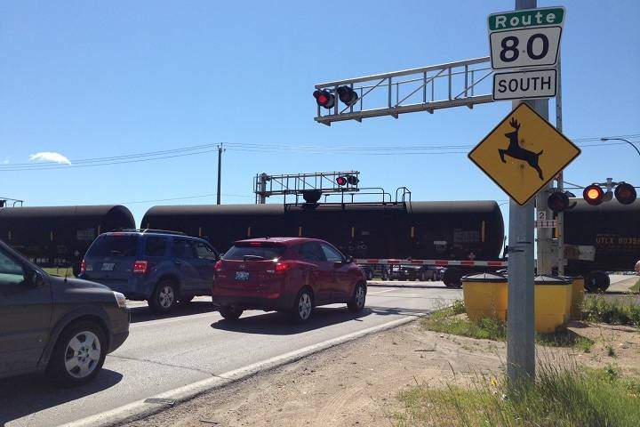 Train delays were a common site at the rail crossing on Waverley Street prior to construction of the underpass.