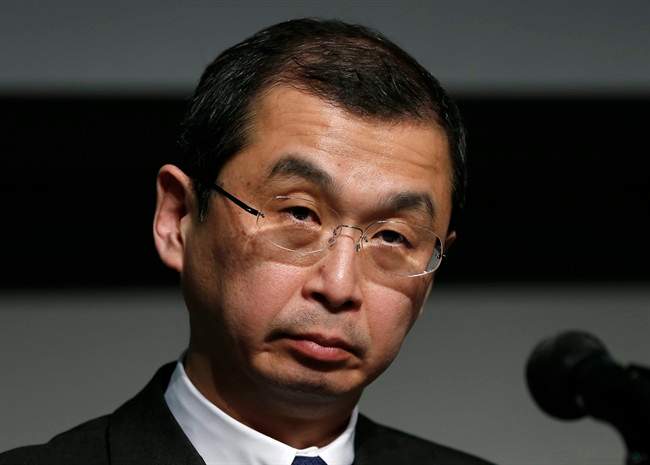 In this June 25, 2015 file photo, Japanese air bag maker Takata Corp. CEO Shigehisa Takada listens to a reporter's question during a news conference in Tokyo.