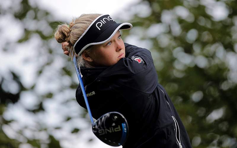 Brooke Henderson of Canada plays on the 15th hole during the second round of the Evian Championship women's golf tournament in Evian, eastern France, Friday, Sept. 11, 2015.