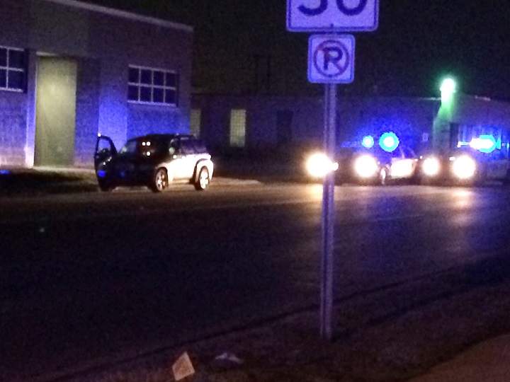 A vehicle driven by a suspect in multiple shootings sits at at Ransom and Porter streets in downtown Kalamazoo, Mich., after the driver was arrested early Sunday morning.