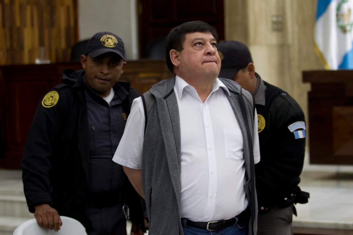 Former army officer Esteelmer Francisco Reyes Giron arrives to court in Guatemala City, Friday, Feb. 26, 2016. 