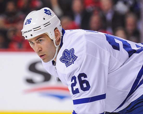 Daniel Winnik #26 of the Toronto Maple Leafs in action against the Calgary Flames during an NHL game at Scotiabank Saddledome on February 9, 2016 in Calgary, Alberta, Canada. (Photo by Derek Leung/Getty Images).