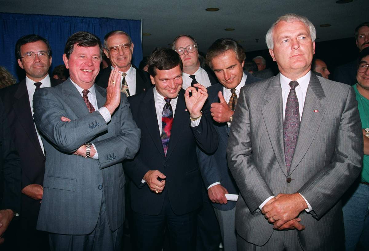 Premiers ham it up following the conclusion of the Canada Round of constitutional negotiations in Ottawa Aug. 22, 1992. (L to R) Gary Filmon of Manitoba, Clyde Wells of Newfoundland, Don Getty of Alberta, Frank McKenna of New Brunswick, Tony Penikett of NWT, and Roy Romanow of Saskatchewan. (CP PHOTO/ Bill Grimshaw)