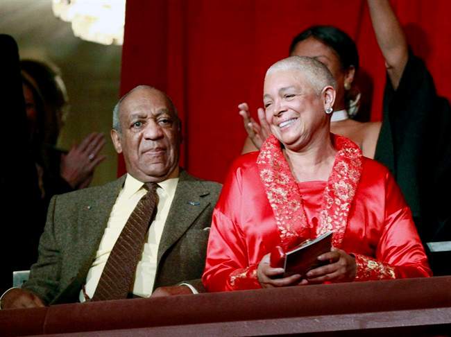 FILE - This Oct. 26, 2009 file photo, comedian Bill Cosby, left, and his wife Camille appear at the John F. Kennedy Center for Performing Arts before Bill Cosby received the Mark Twain Prize for American Humor in Washington.