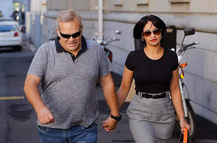 Celeste Nurse, right, the mother of a girl that was kidnapped as a baby nearly 19 years ago, arrives at a court for the appearance of a South African woman suspected of the kidnapping in Cape Town, South Africa, Tuesday, Feb. 23, 2016. 