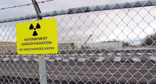 This Nov. 1, 2013 photo shows rows of chambers holding intermediate-level radioactive waste in shallow pits at the Bruce Power nuclear complex near Kincardine, Ontario. 