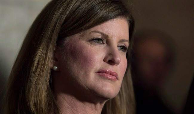 Interim Conservative leader Rona Ambrose speaks with the media following question period in Ottawa on December 8, 2015. 
