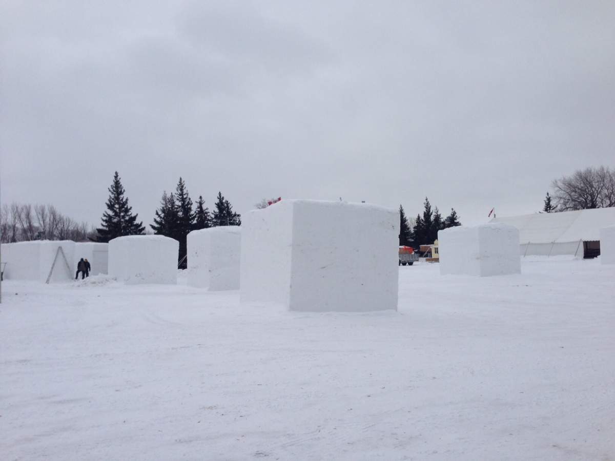 Festival ice sculptures starting to take shape Monday.