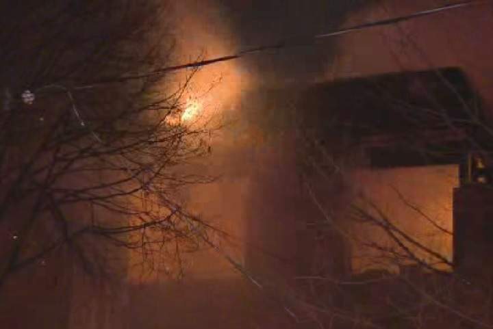 Crews respond to a two-alarm fire on Stibbard Ave. on Feb. 18, 2016.